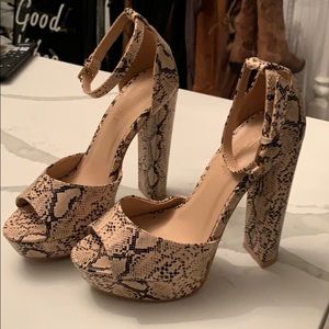Snakeskin high heels from in the style